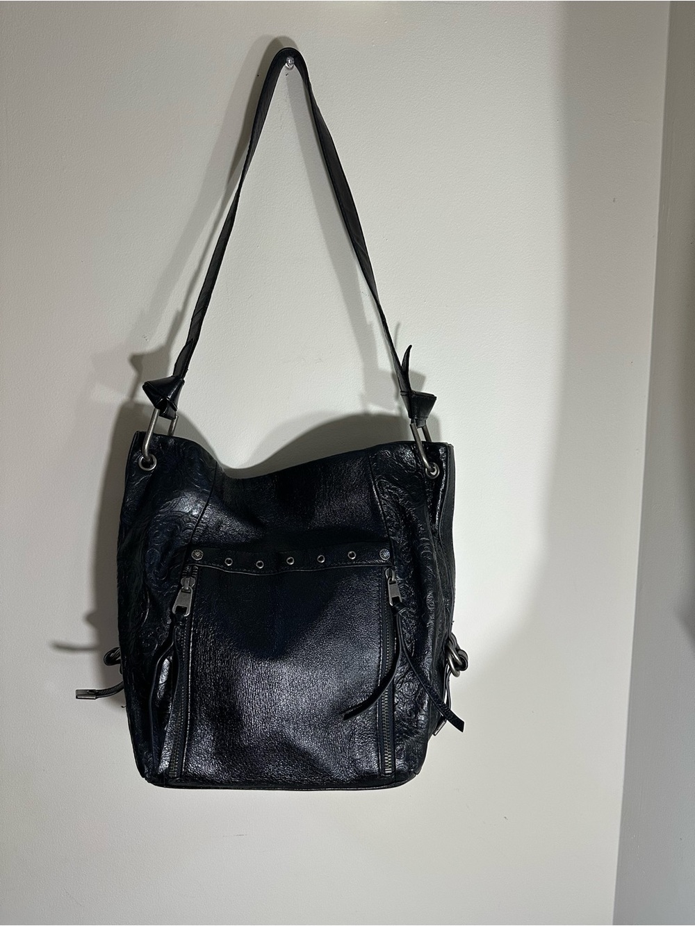 The Sak Black Leather Shoulder Bag with Silver Hardware
